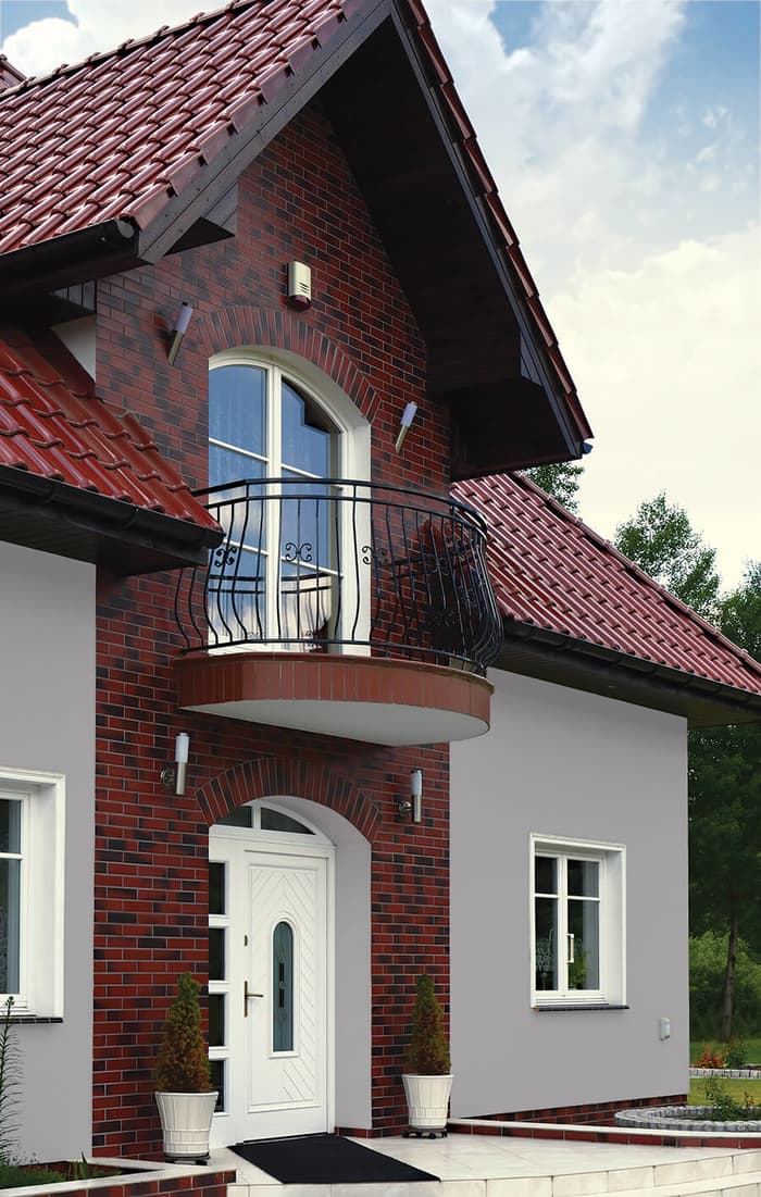 Hausfassade mit Klinkerriemchen Wild Wine